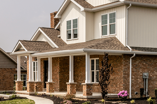 big brick house with hung windows